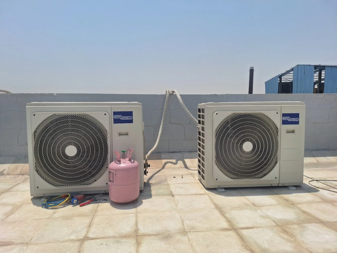 Total Proz AC Repair technician servicing an HVAC system in Brooklyn, NY